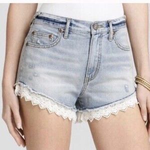 Free people denim shorts with lace